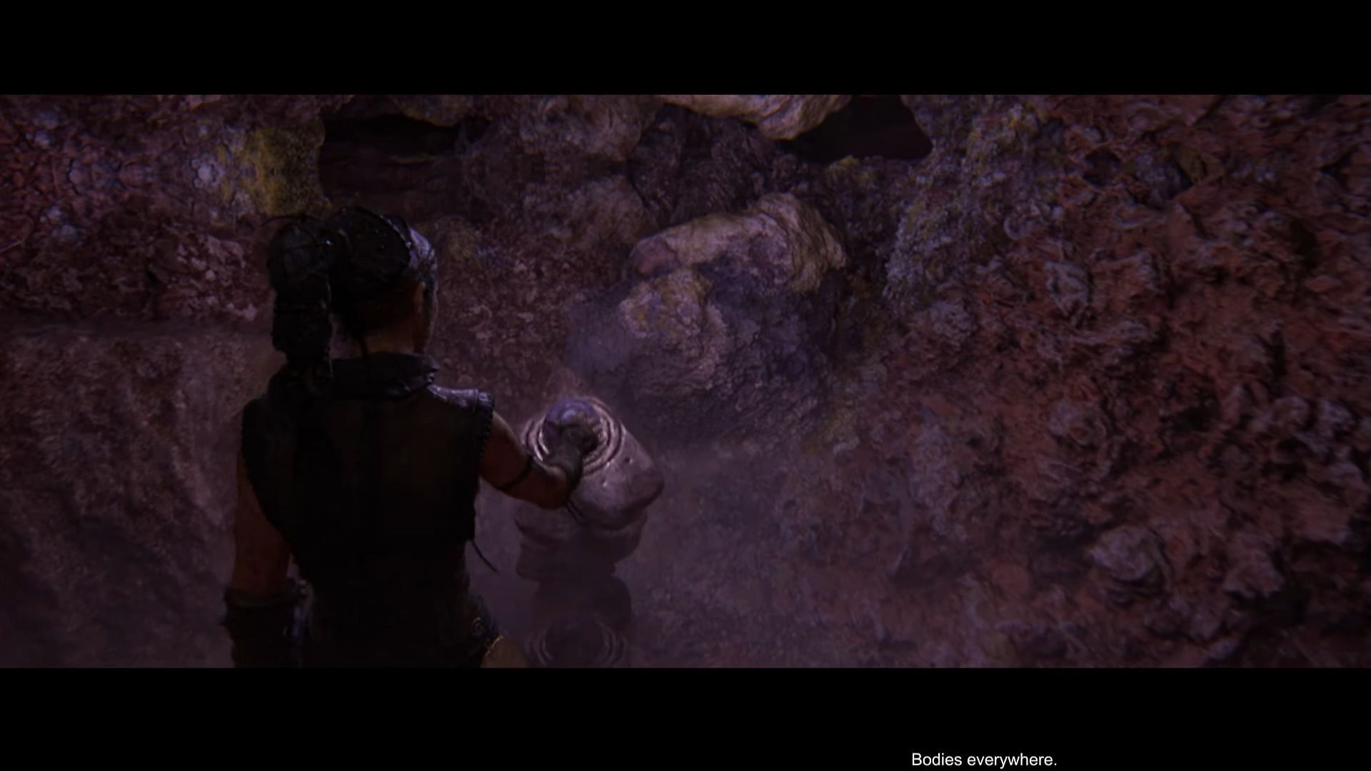 The world will mirror whenever you pick up your first stone ball. (Image via Ninja Theory || YouTube/Zyaz King)