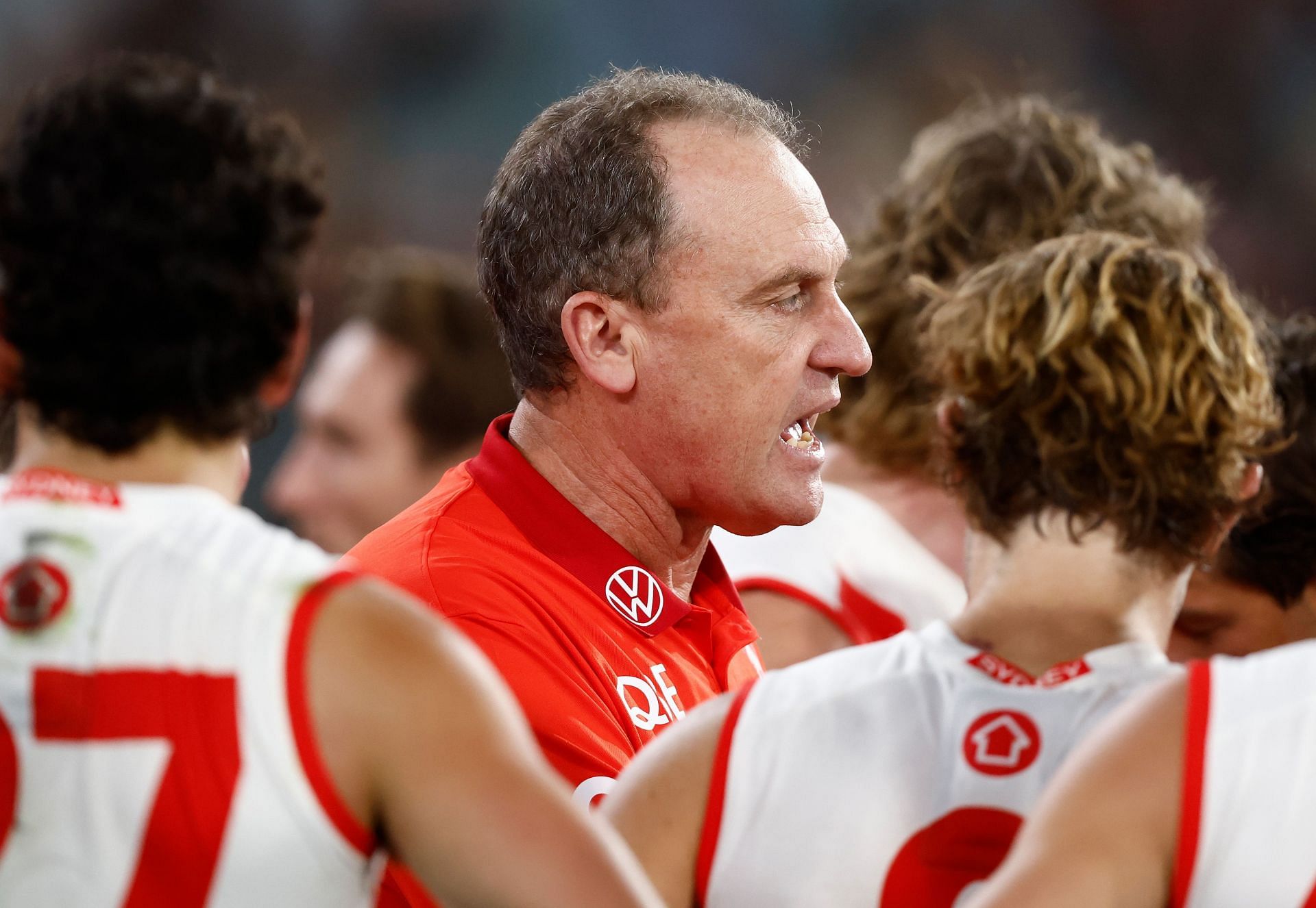 John Longmire, Senior Coach of the Swans addresses his players during the 2024 AFL round seven match