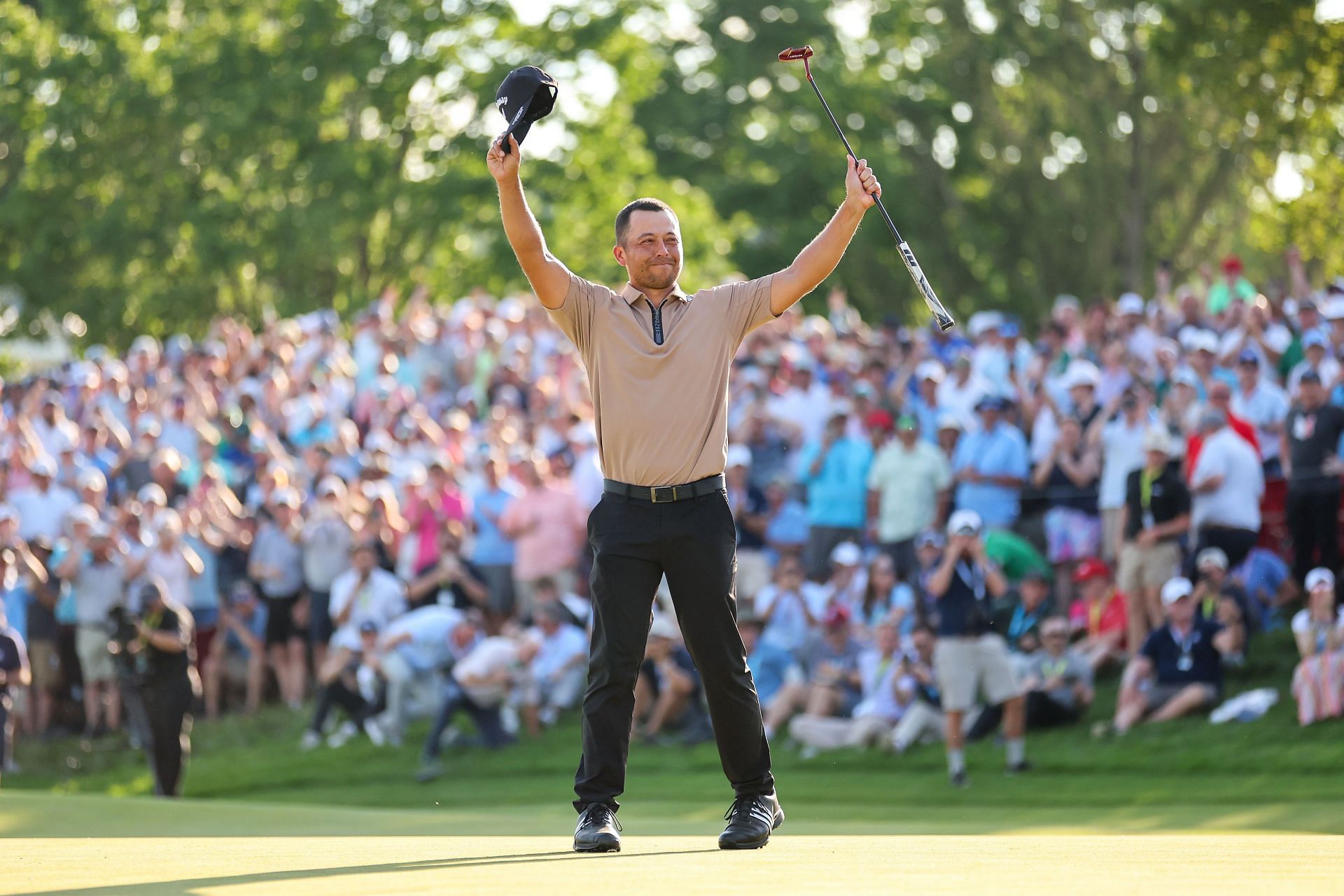 Xander Scahuffele celebrates after winning the 2024 PGA Championship