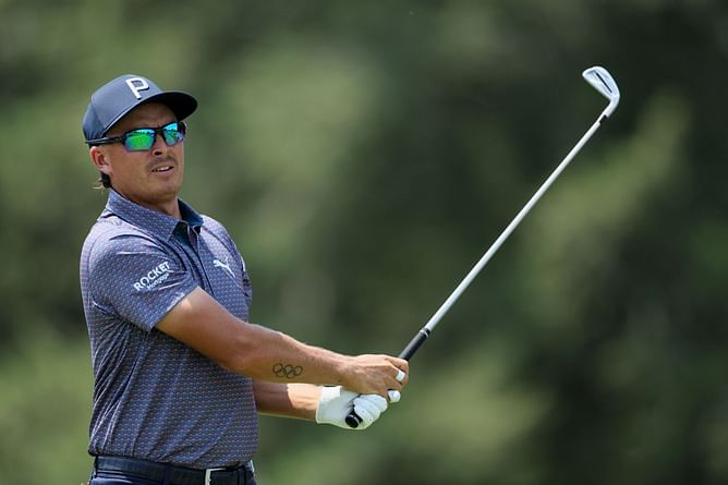 Rickie Fowler finds new caddie, makes a young fan's dream come true at the 2024 Rocket Mortgage Classic