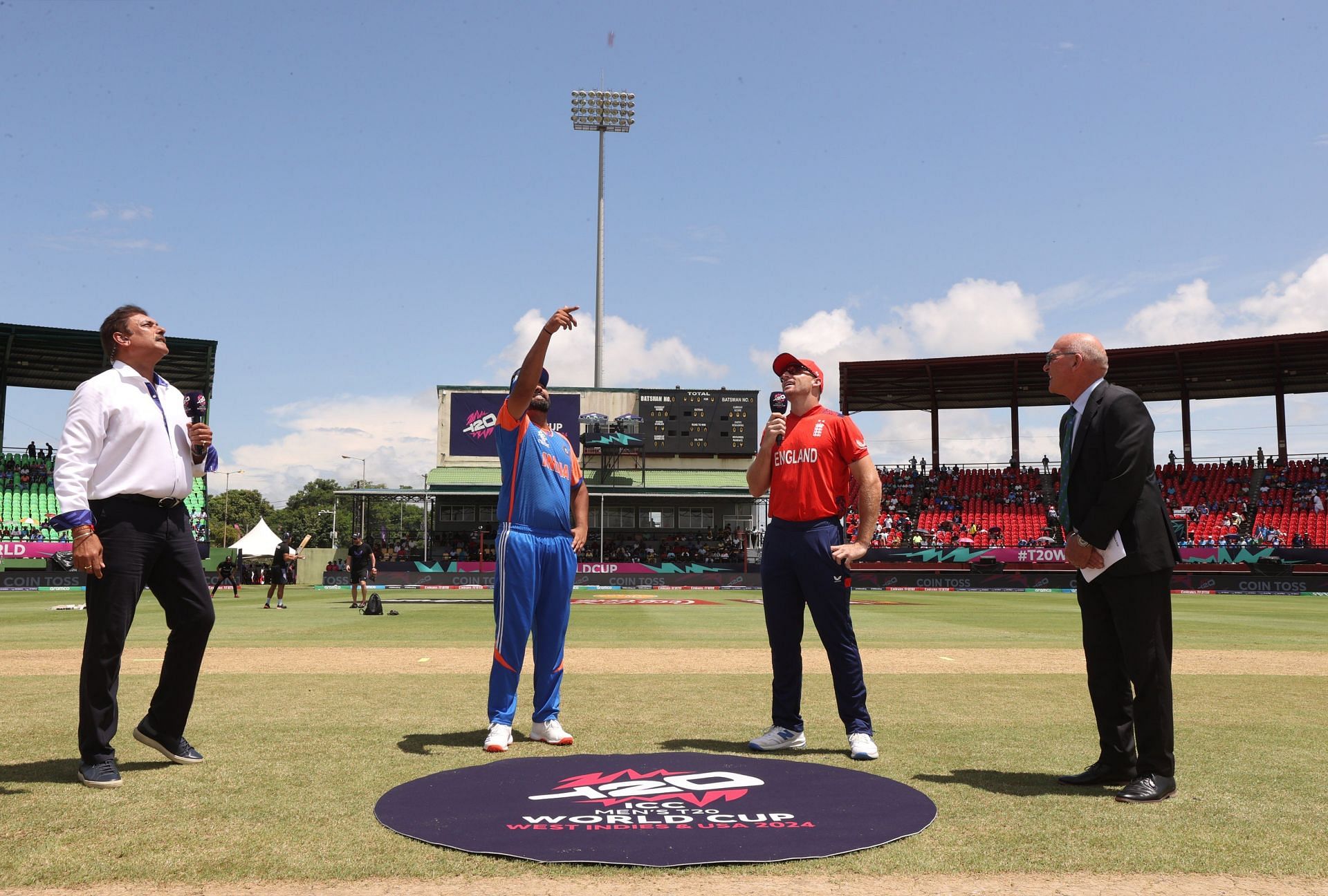टॉस के दौरान रोहित शर्मा और जोस बटलर (Photo Courtesy: X/@BCCI)