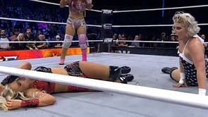 Mariah May accidentally gets hit on her head with a champagne bottle; Toni Storm left stunned