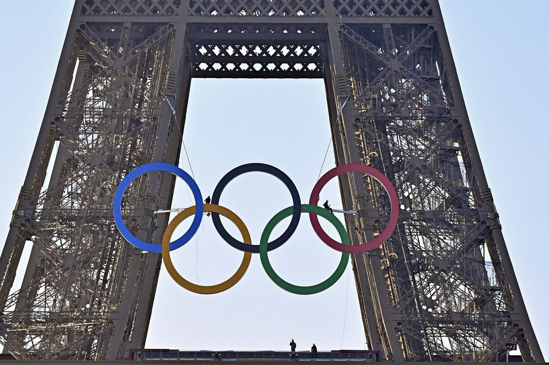 The Olympic Rings are displayed on the Eiffel Tower - 50 days before the opening of the Olympic Games