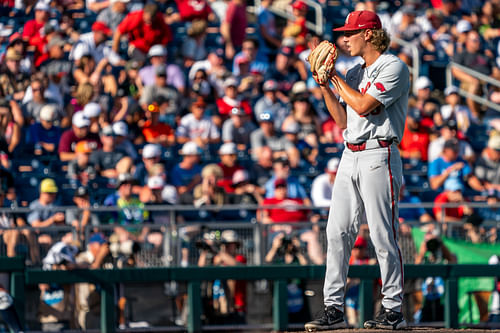 Hagen Smith pitches in the 2022 College World Series against Ole Miss.