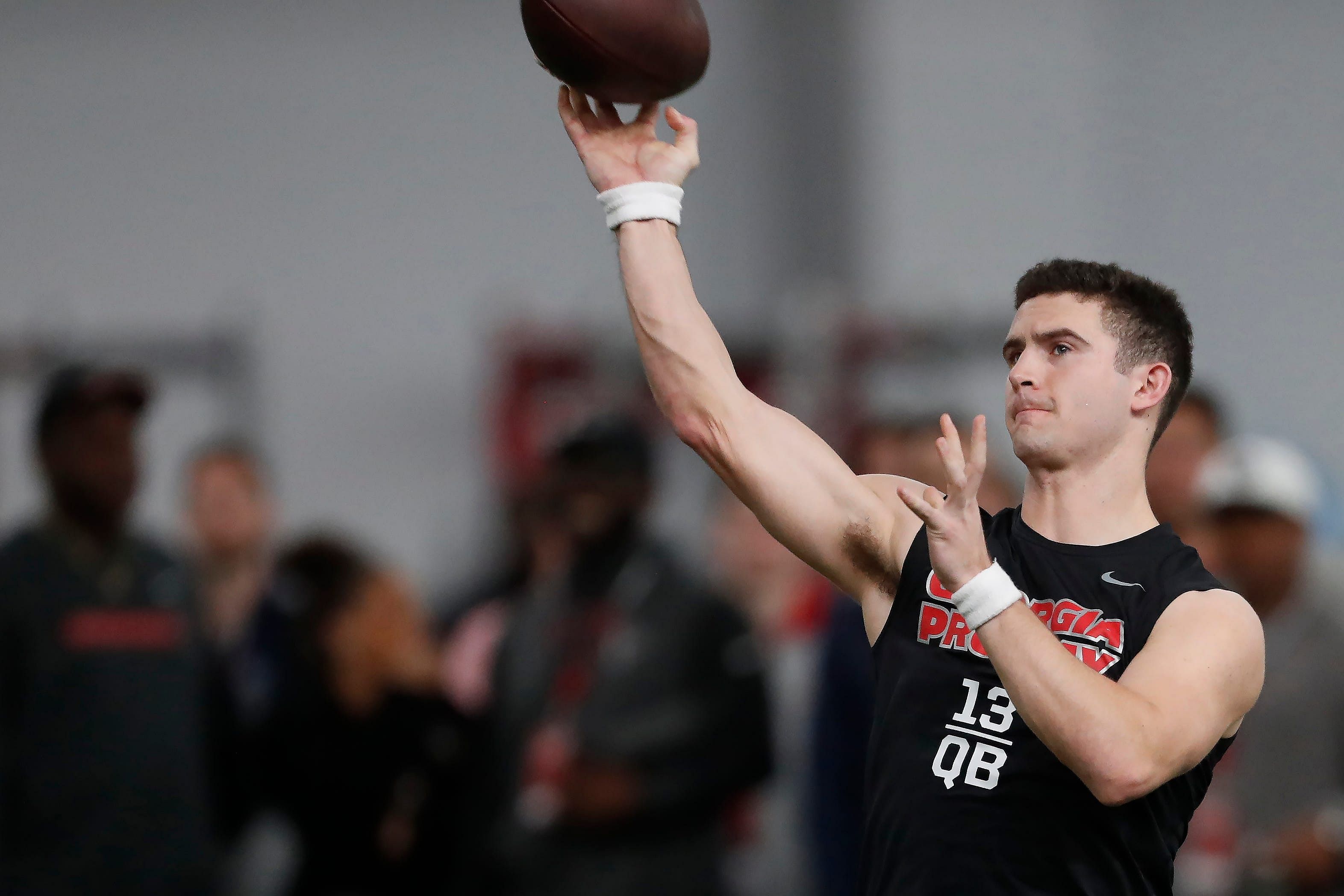 Syndication: Online Athens: Georgia quarterback Stetson Bennett (13) throws a pass during Georgia&#039;s Pro Day in Athens, Ga., on Wednesday, March 15, 2023. News Joshua L Jones