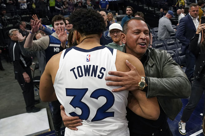 PHOTO: Alex Rodriguez gets joined by NBA star Karl-Anthony Towns for a chat in Timberwolves clubhouse