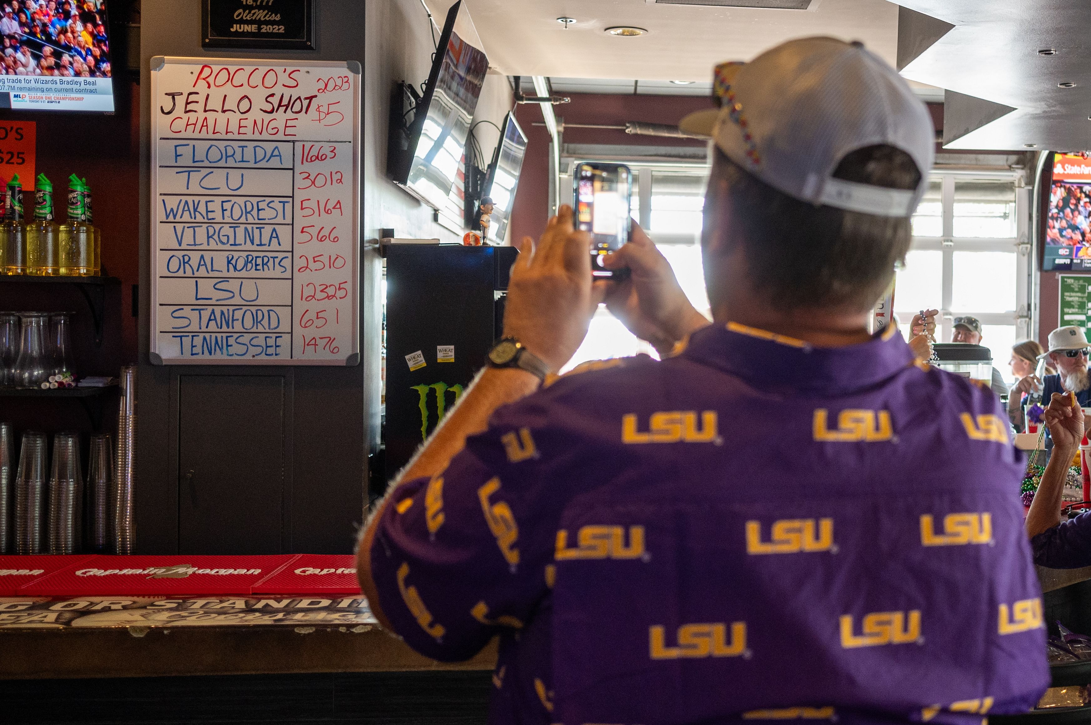 An LSU fan notes the &quot;score&quot; at Rocco&#039;s in Omaha, where fans can take an active role in the competition.