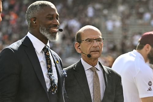 "SEC Nation" analyst Roman Harper (left) and Paul Finebaum speak before a college football game between the Texas A&M Aggies and the Auburn Tigers at Kyle Field on Sept. 23 in College Station, Texas. Mandatory credit: Maria Lysaker, USA Today Sports