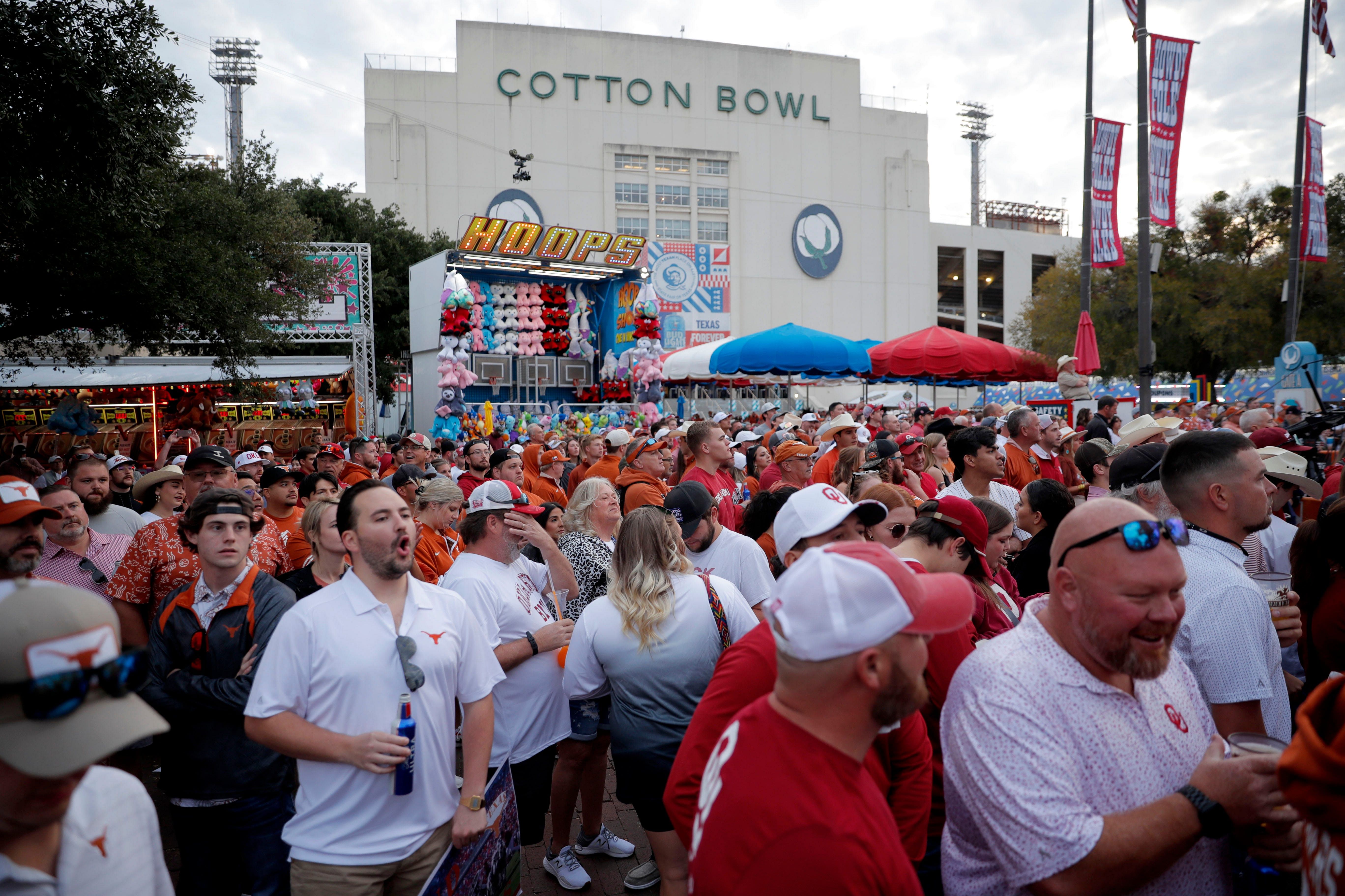 Fans outside the Cotton Bowl Stadium in Dallas, TX