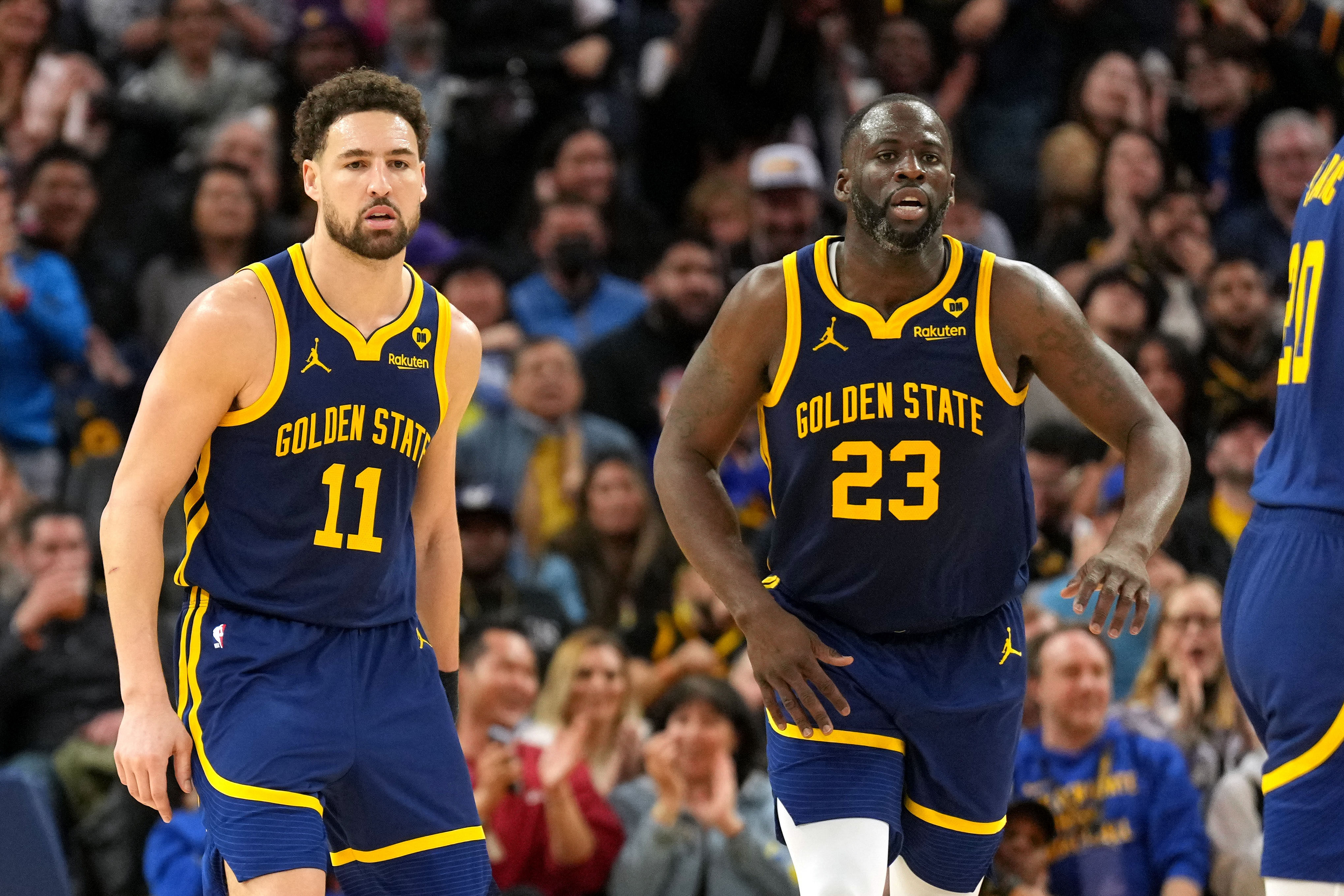 Golden State Warriors guard Klay Thompson and forward Draymond Green