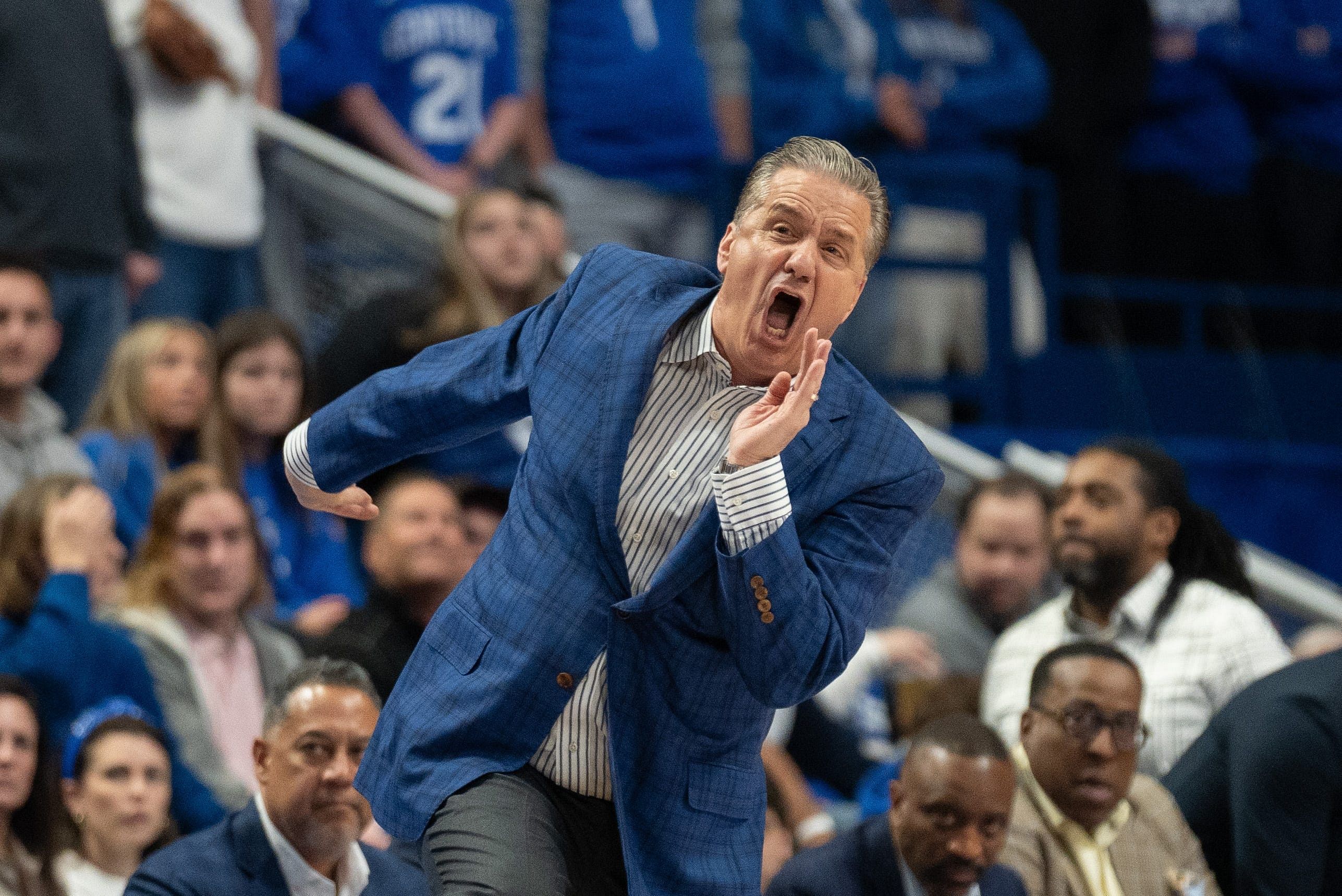 Former Kentucky Wildcats head coach John Calipari yells to the team.