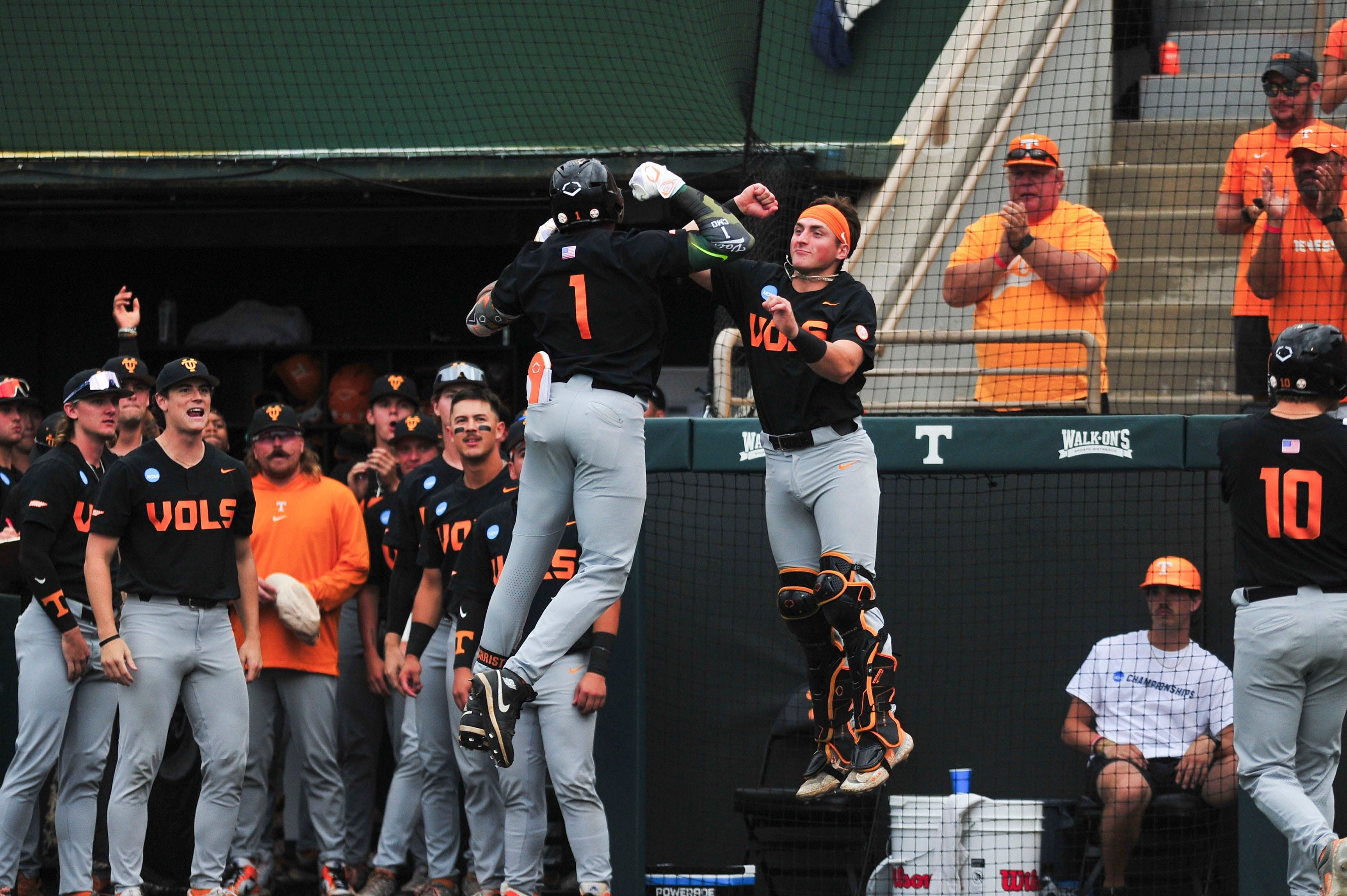 Tennessee celebrates after Christian Moore smacked a home run in the first inning.