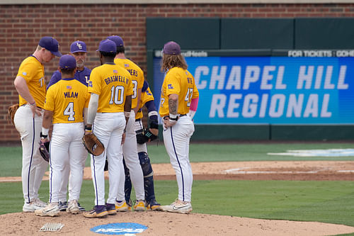 LSU huddles to map out the strategy in the latter part of the game.