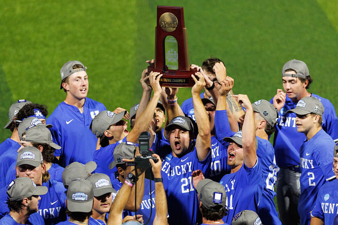 WATCH: Kentucky baseball HC Nick Mingione affectionately embraces his players following program's historic achievement