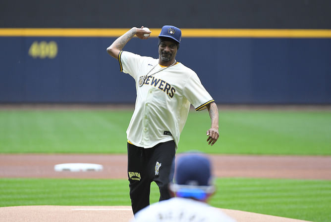 In Photos: Snoop Dogg takes the mound for ceremonial first pitch in Brewers jersey