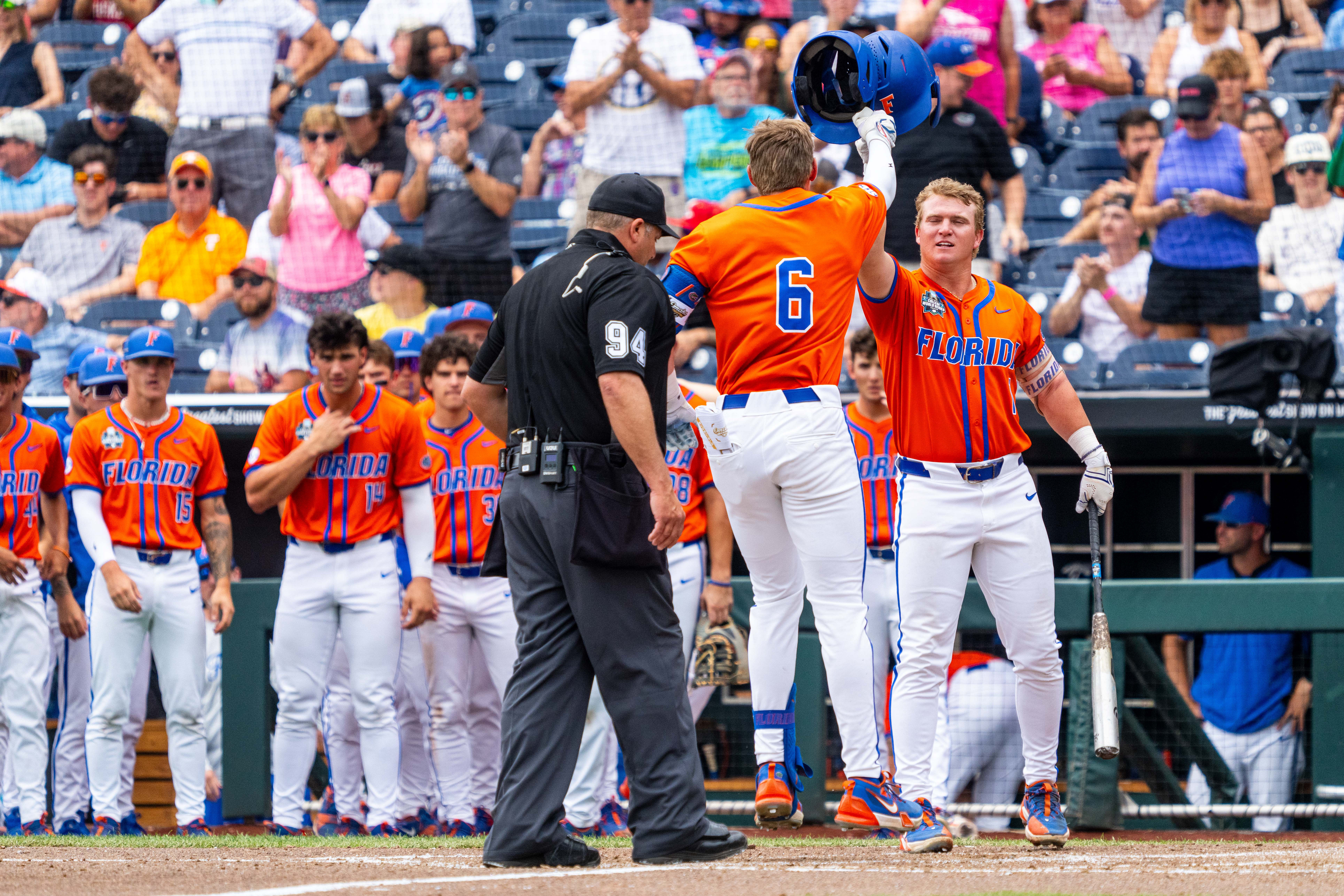 Tyler Shelnut (#6) celebrates the home run with his teammates.