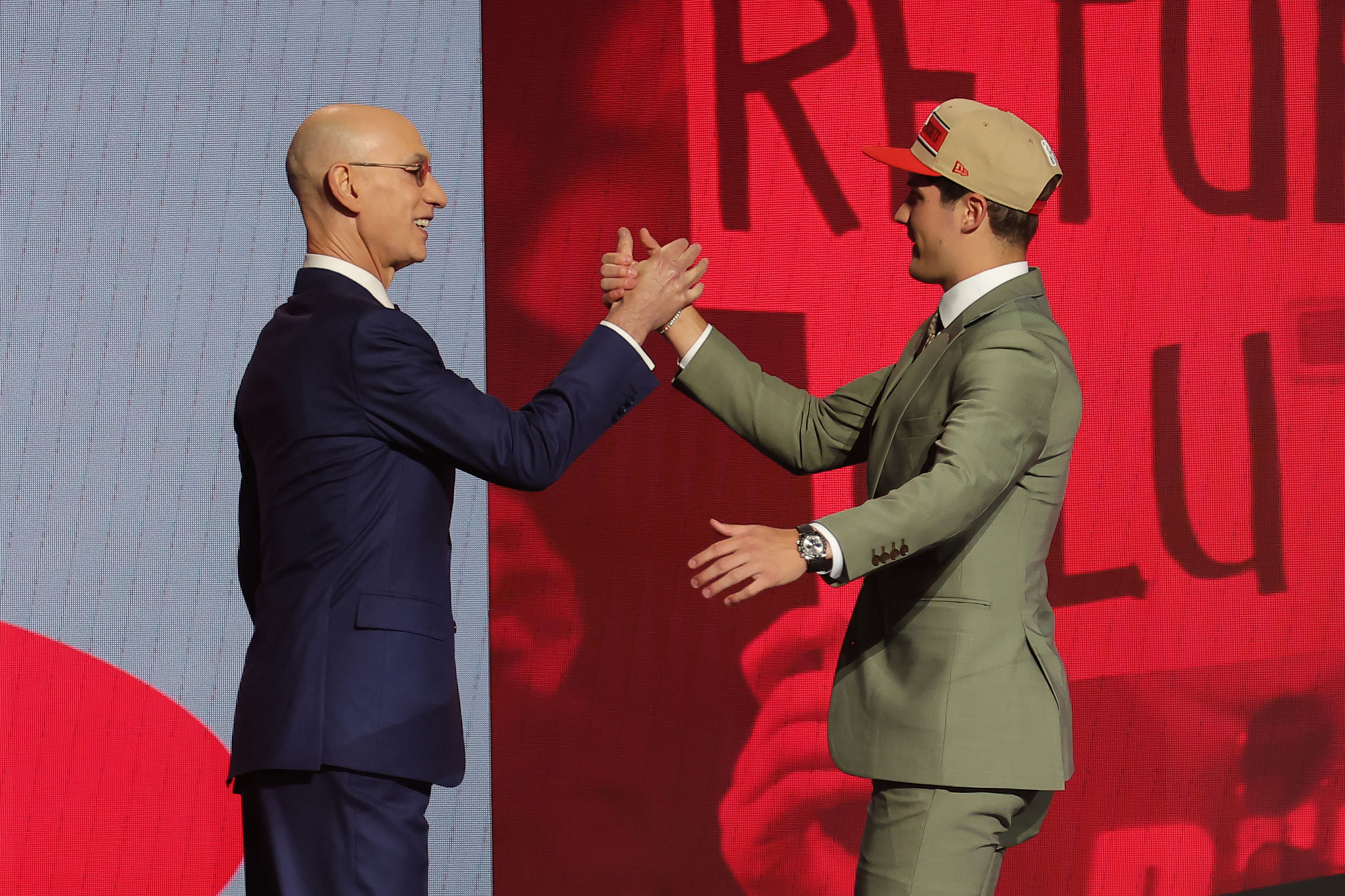 NBA Commissioner Adam Silver greeted Reed Sheppard on stage after the Kentucky guard was selected by the Houston Rockets as the No. 3 overall pick in the 2024 NBA draft.