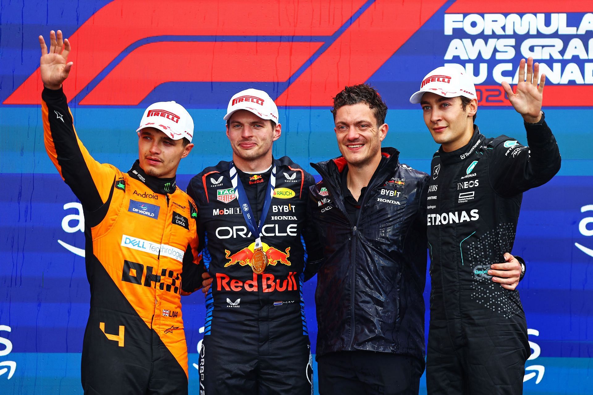 F1 Grand Prix of Canada MONTREAL, QUEBEC - JUNE 09: Race winner Max Verstappen of the Netherlands and Oracle Red Bull Racing, Second placed Lando Norris of Great Britain and McLaren and Third placed George Russell of Great Britain and Mercedes celebrate on the podium after the F1 Grand Prix of Canada at Circuit Gilles Villeneuve on June 09, 2024 in Montreal, Quebec. (Photo by Mark Thompson/Getty Images)