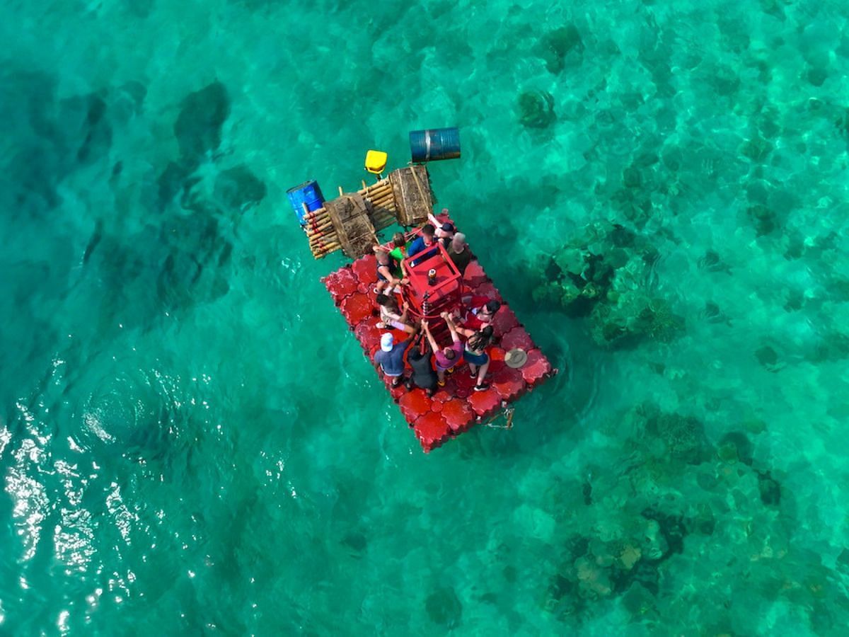 Contestants on the buoy at the end of the challenge (Image via Netflix)