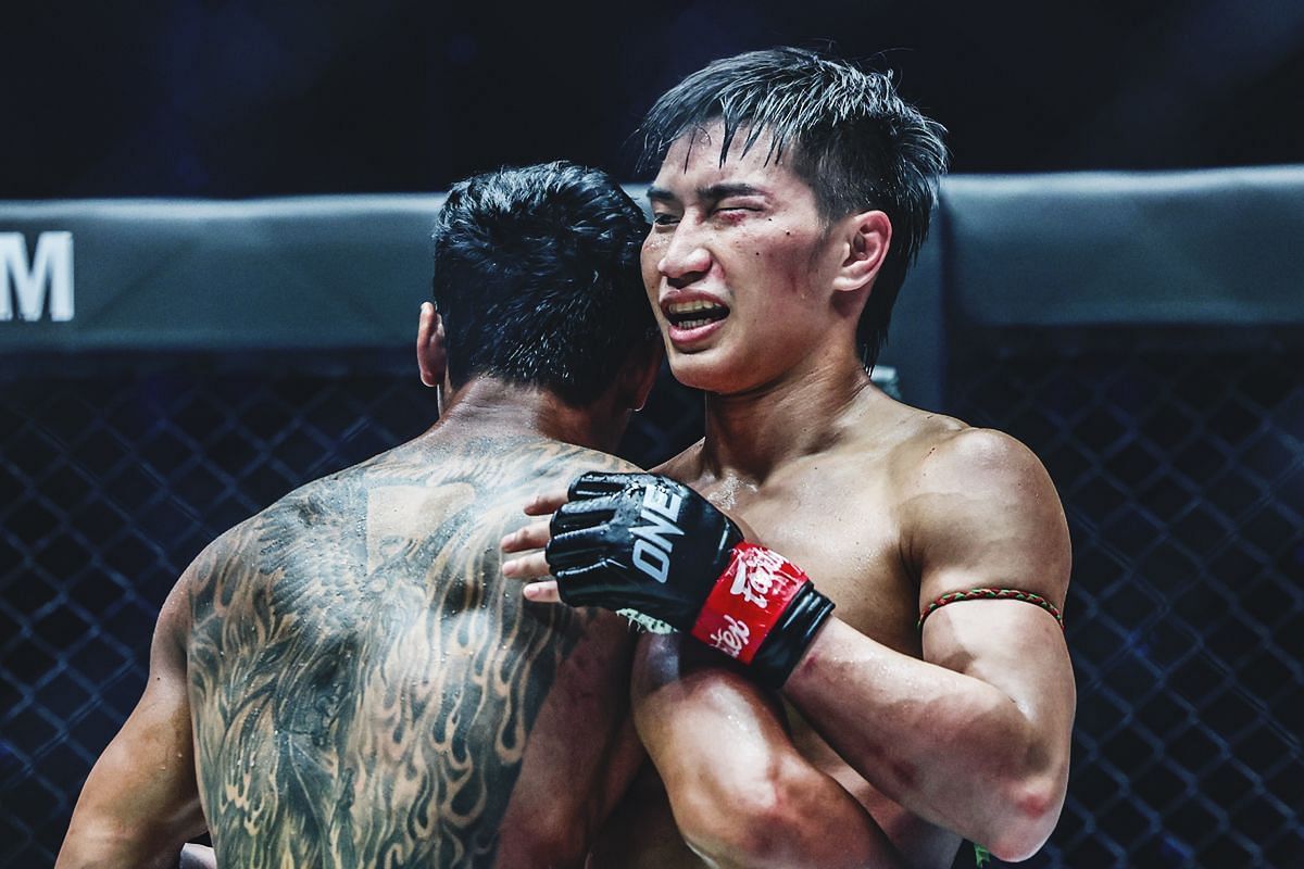 Jo Nattawut (L) hugs Tawanchai (R) | Photo by ONE Championship