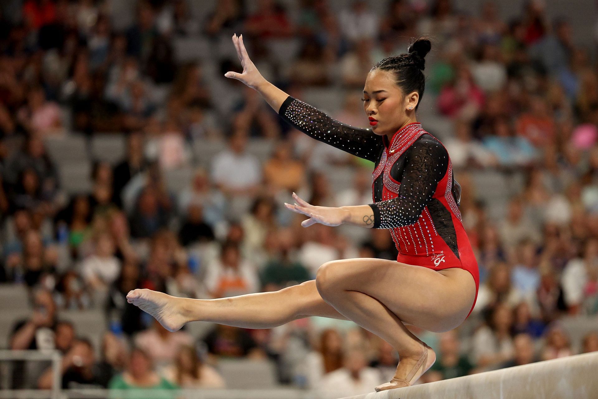 Suni Lee competes on the balance beam during the 2024 Xfinity U.S. Gymnastics Championships at Dickies Arena in Fort Worth, Texas.