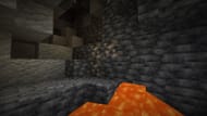 Deepslate iron ore next to lava (Image via Mojang)