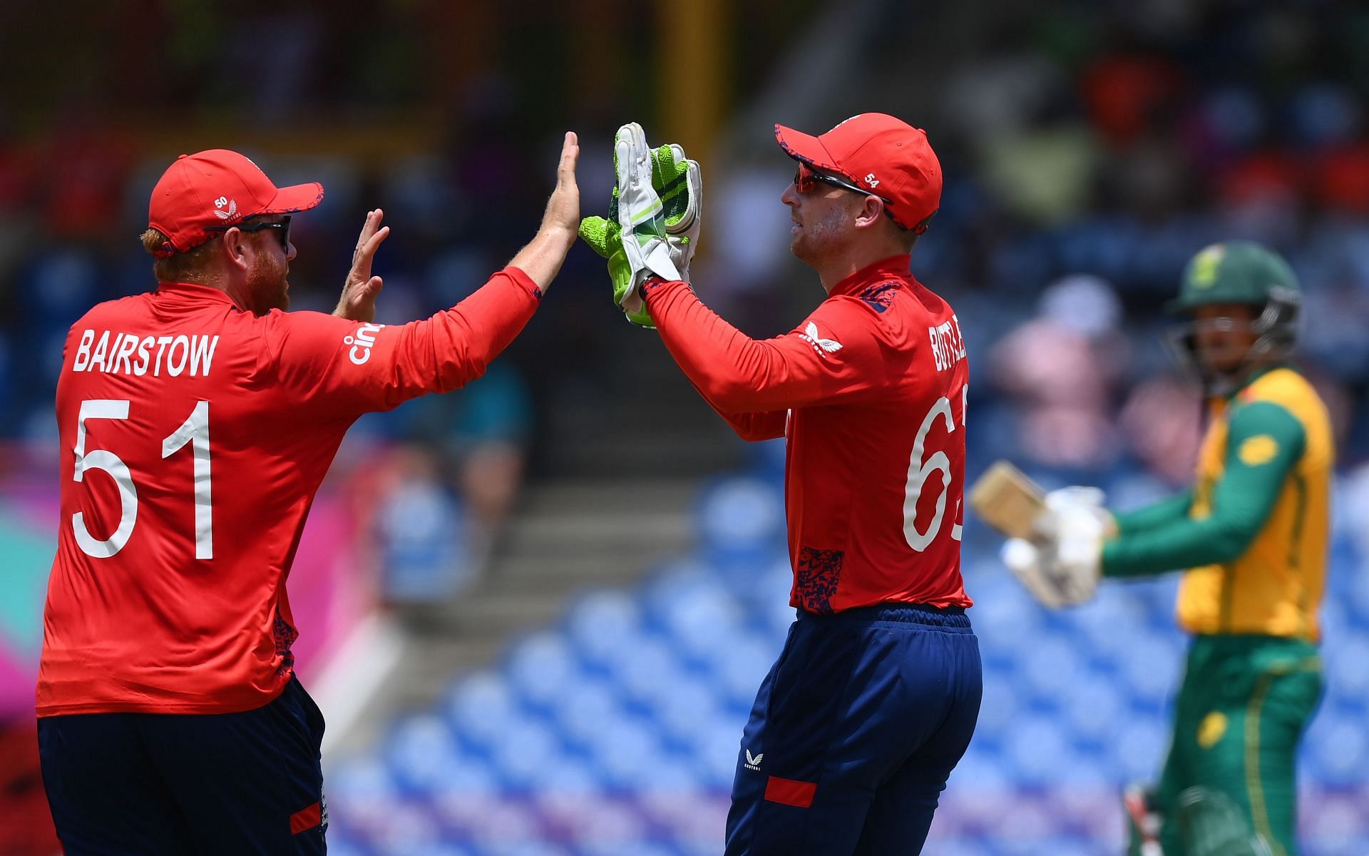 Jos Buttler and Jonny Bairstow celebrate the wicket. (Credits: Twitter)