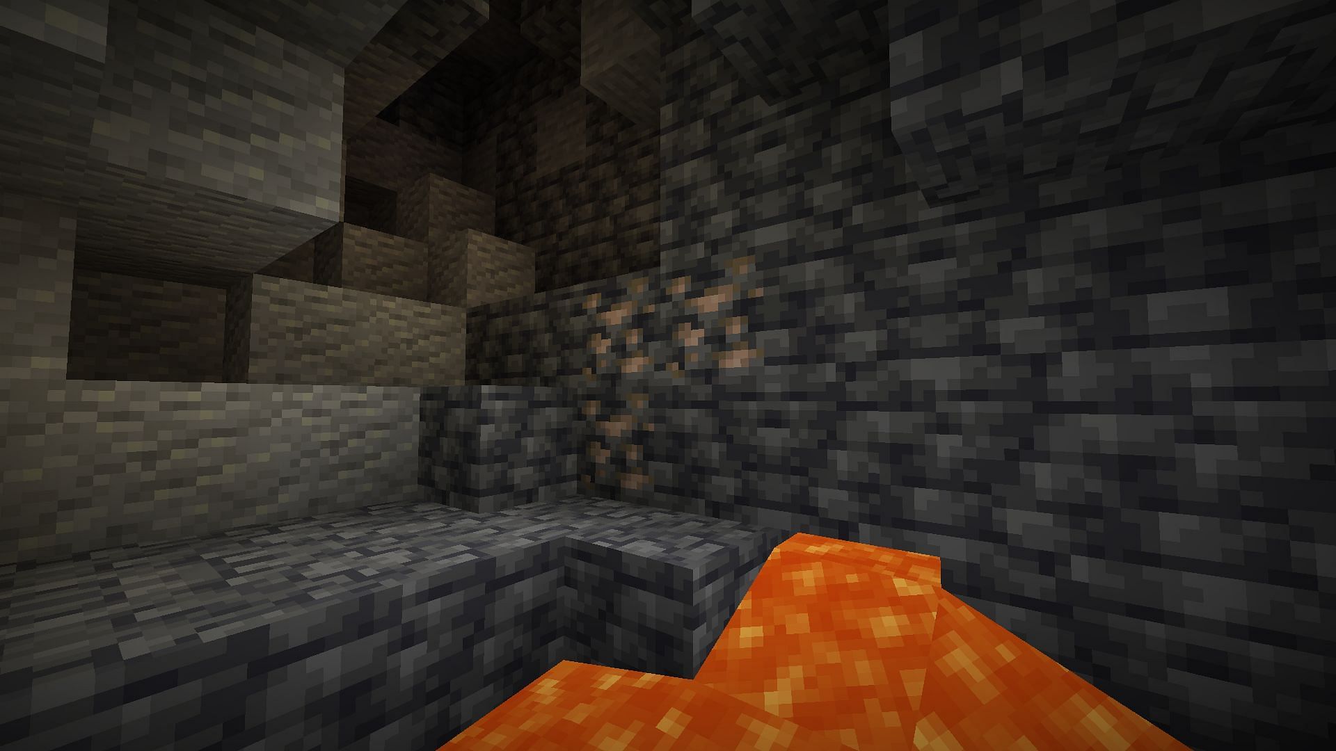 Iron ore found near a trail of lava (Image via Mojang)