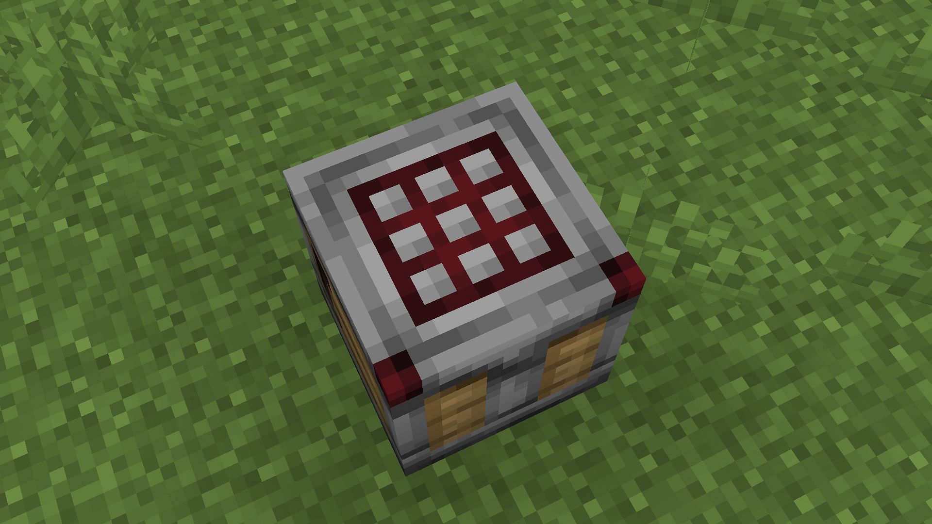 The crafter block is easily recognizable due to the crafting grid on it (Image via Mojang)