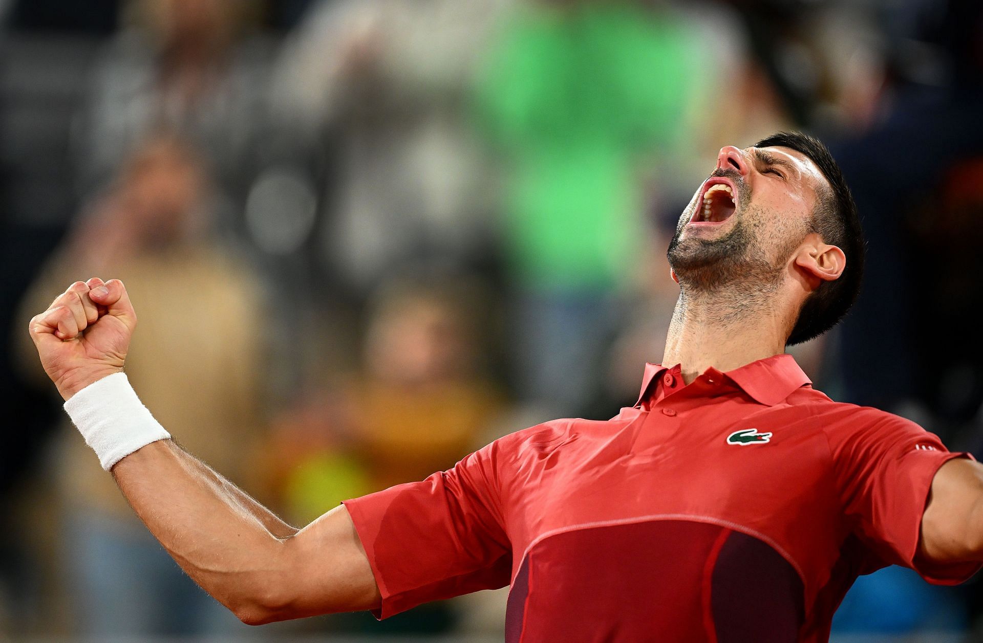 Novak Djokovic celebrates his third-round win over Lorenzo Musetti at the 2024 French Open