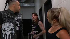 Liv Morgan reacts to Dominik Mysterio taking his vest back from her on WWE RAW
