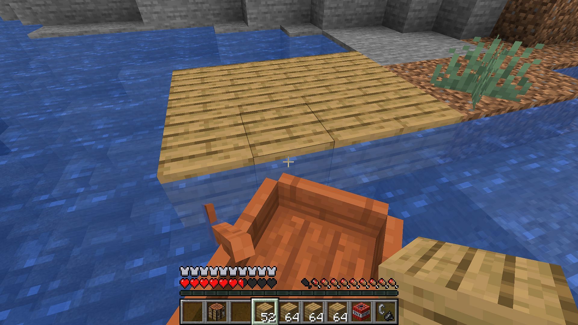 Building on boats was much more frustrated before this bug was fixed (Image via Mojang)