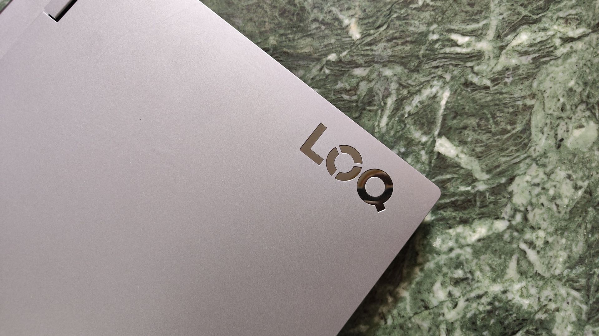 The LOQ branding on the laptop (Image via Sportskeeda)