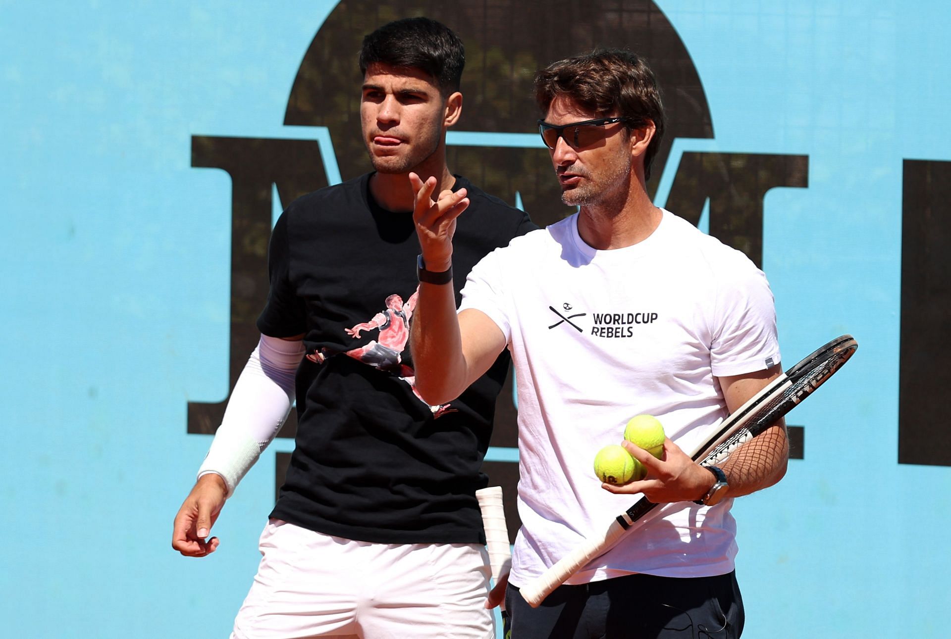 Carlos Alcaraz and coach Juan Carlos Ferrero at the Mutua Madrid Open