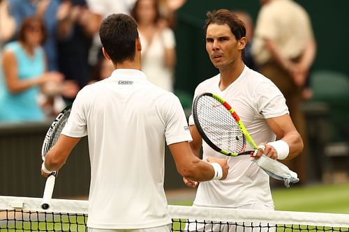 Novak Djokovic and Rafael Nadal at the 2018 Wimbledon. The Championships - Wimbledon 2011: Day Thirteen