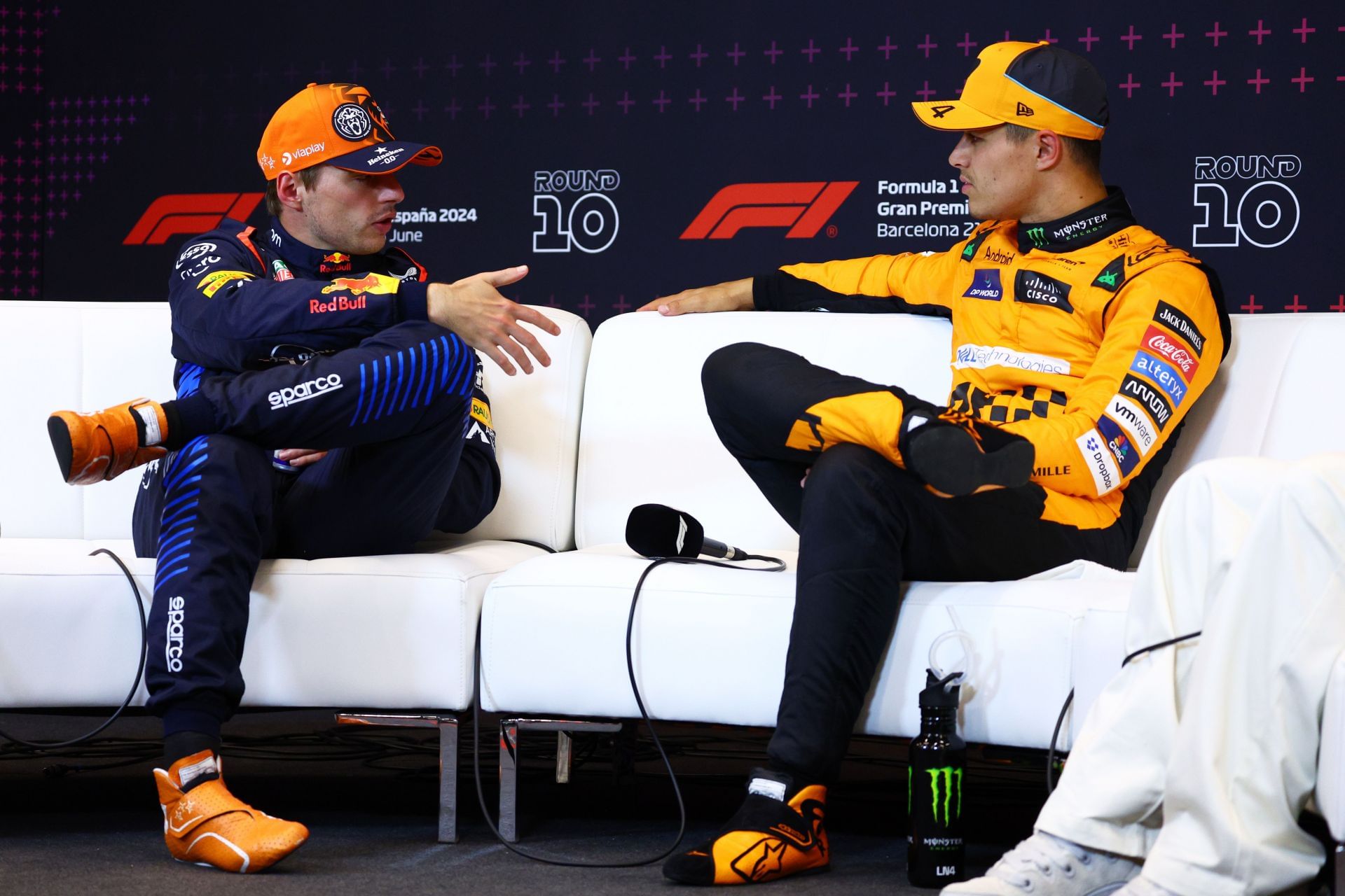 2nd placed qualifier Max Verstappen of the Netherlands and Oracle Red Bull Racing and Pole position qualifier Lando Norris of Great Britain and McLaren - Getty Images