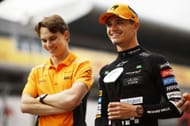 Second placed Lando Norris of Great Britain and McLaren smiles with his trophy and teammate Oscar Piastri of Australia and McLaren after the F1 Grand Prix of Spain at Circuit de Barcelona-Catalunya on June 23, 2024 in Barcelona, Spain. (Photo by Chris Graythen/Getty Images)