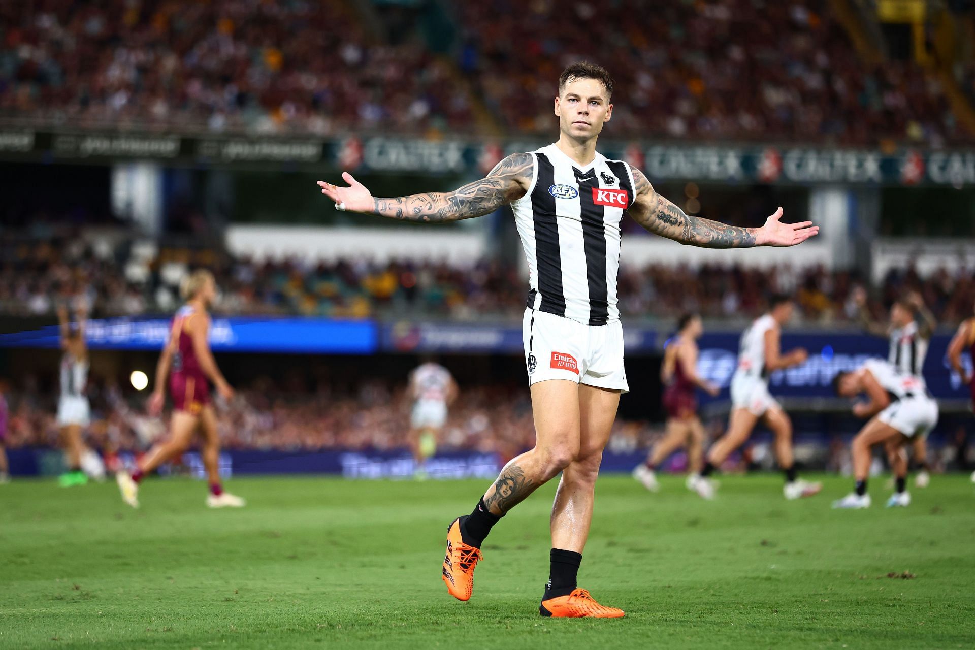 Jamie Elliott of the Magpies celebrates a goal