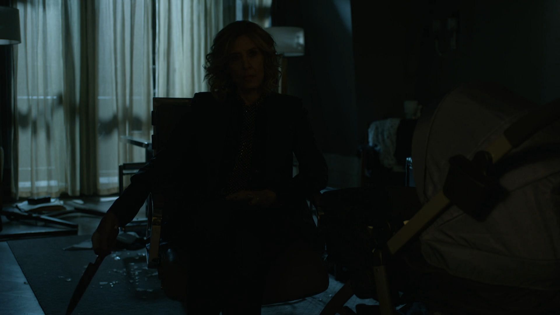 Sheryl waiting for Leland in the dark, as seen in Evil season 4 episode 6 (Image via Paramount+)