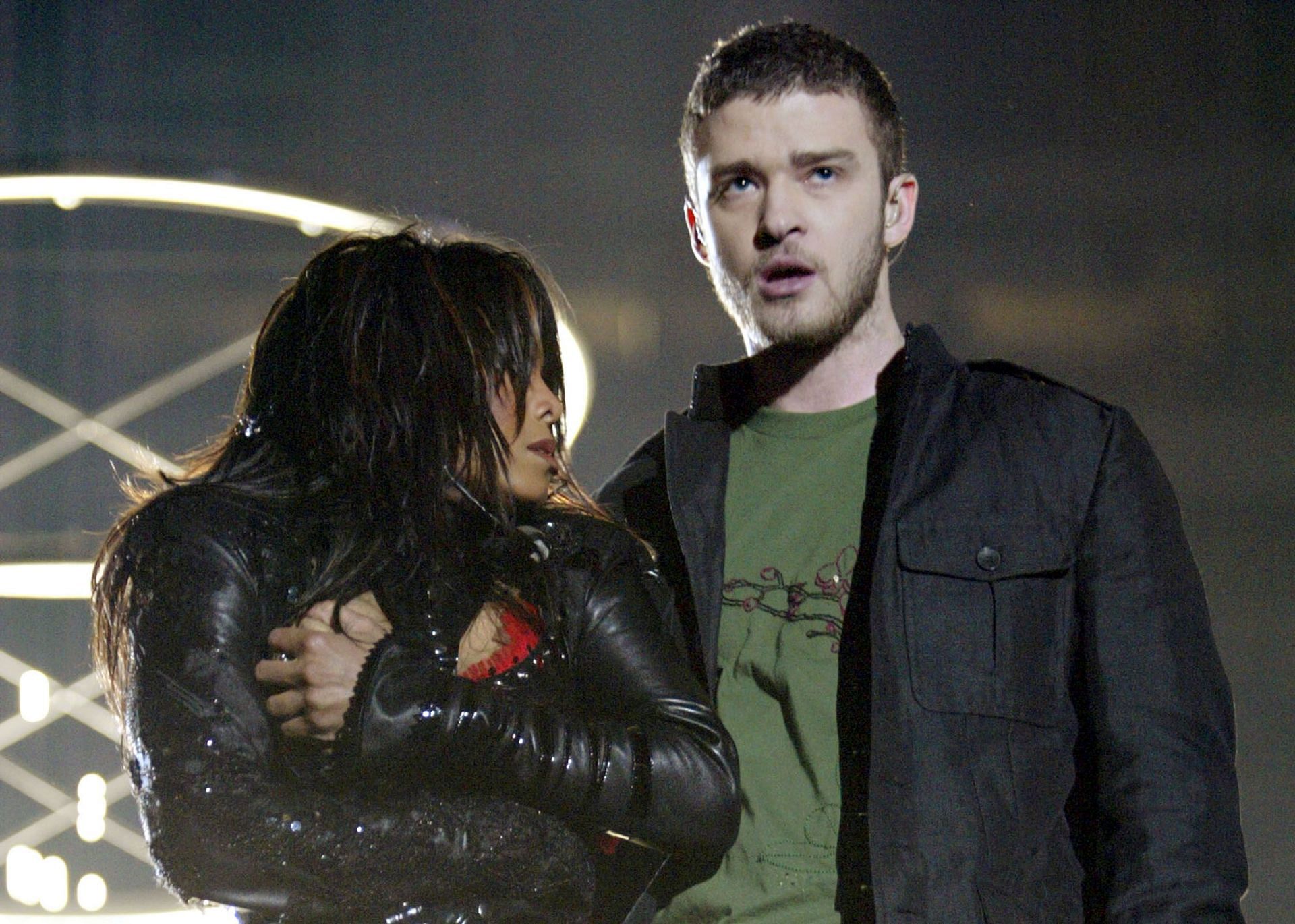 Janet Jackson and surprise guest Justin Timberlake perform during the halftime show at Super Bowl XXXVIII on February 1, 2004 in Houston, Texas. At the end of the performance, Timberlake tore away a piece of Jackson&#039;s outfit. (Photo by Frank Micelotta/Getty Images)