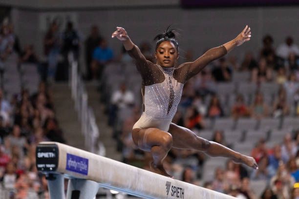 How tall is Simone Biles?