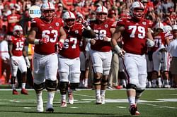 Rutgers OT Ja'Elyne Matthews makes his commitment known with a pizza announcement featuring the team logo