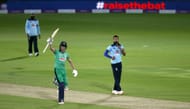 Harry Tector of Ireland celebrates victory watched on by Saqib Mahmood of England during the Third One Day International between England and Ireland in the Royal London Series at Ageas Bowl on August 04, 2020 in Southampton, England.