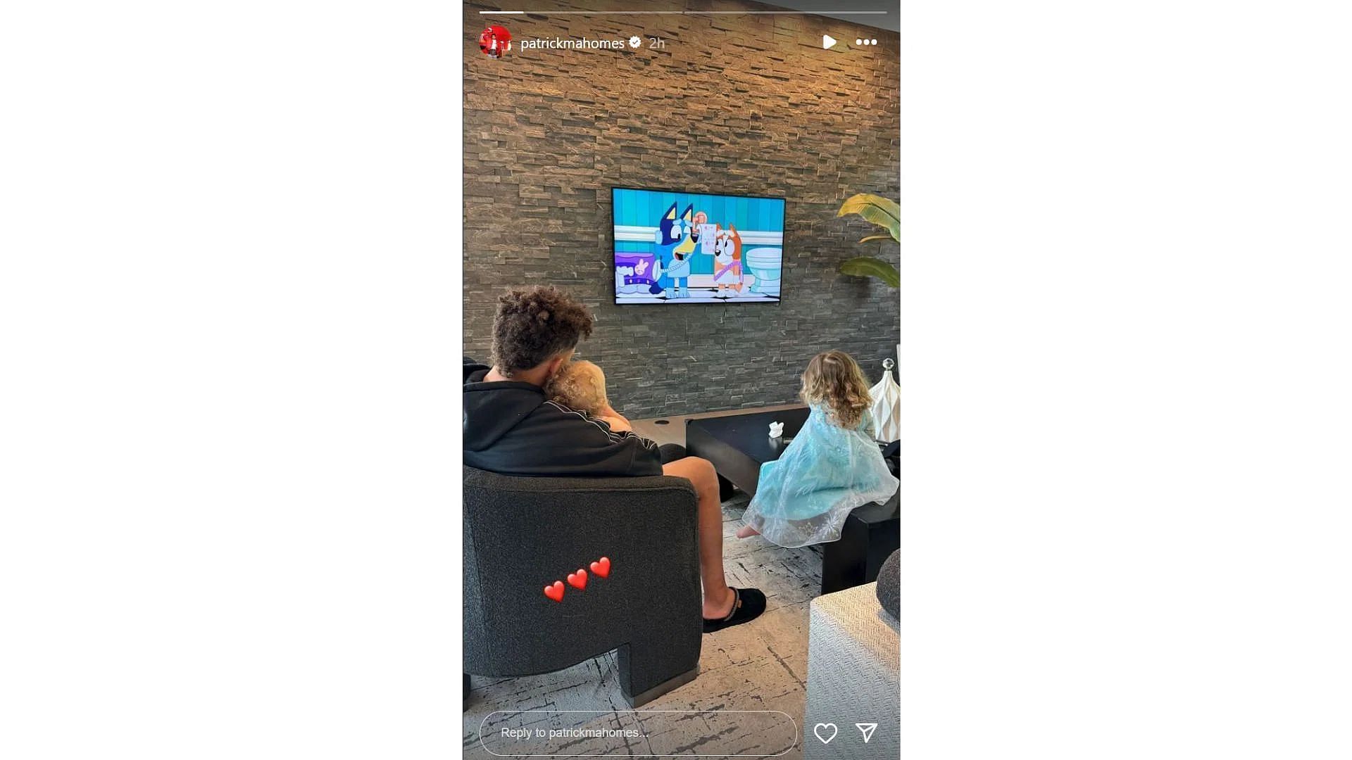 Patrick Mahomes watching Bluey with son Bronze and daughter Sterling (From: @brittanylynne IG)