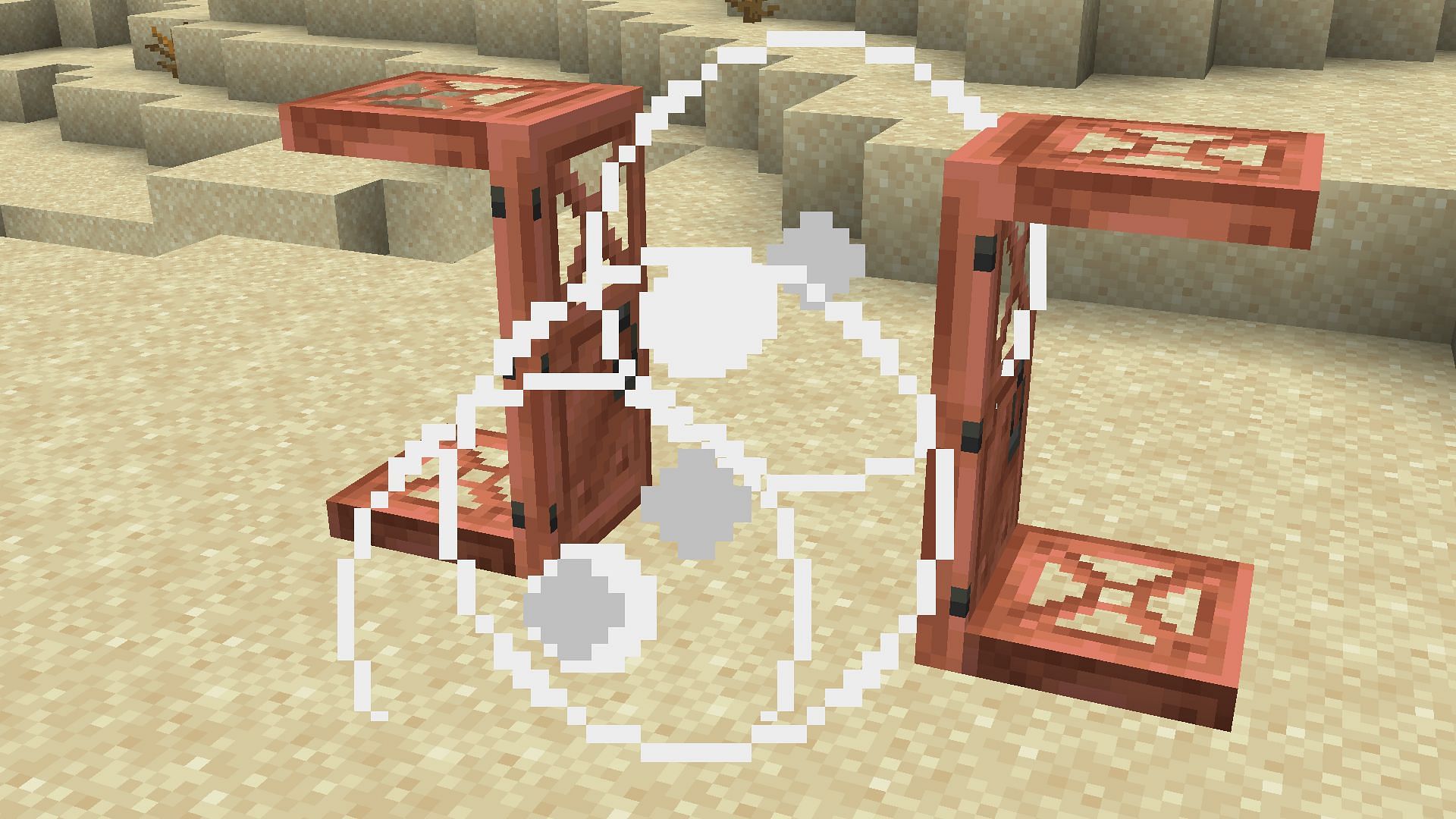 A wind charge opening both copper doors and trapdoors (Image via Mojang)