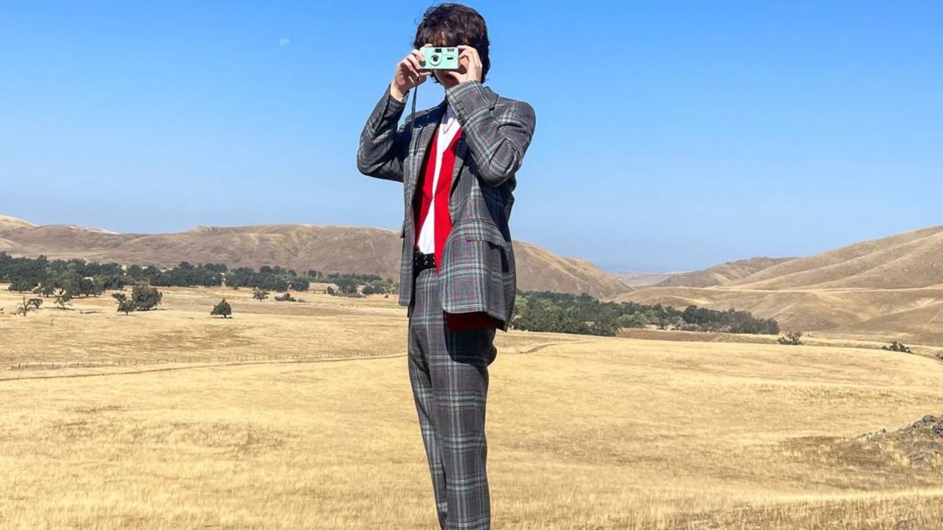 Jin in plaid suit set (Image via Instagram/ Jin)