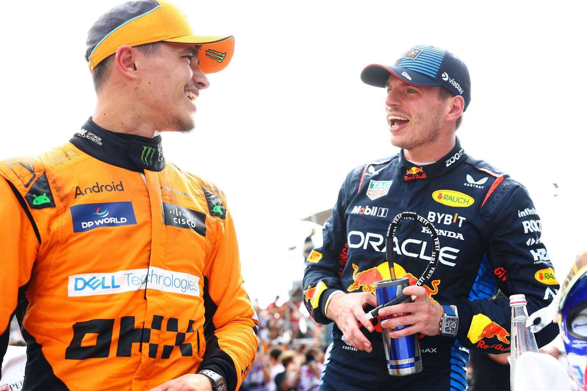 Max Verstappen of Oracle Red Bull Racing and Lando Norris of McLaren talk in parc ferme. Courtesy: Getty Images