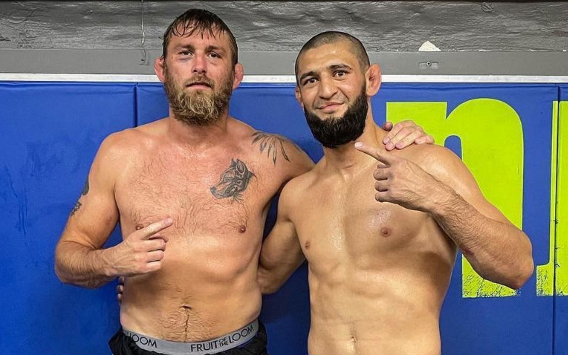 Alexander Gustafsson (left) explains Khamzat Chimaev