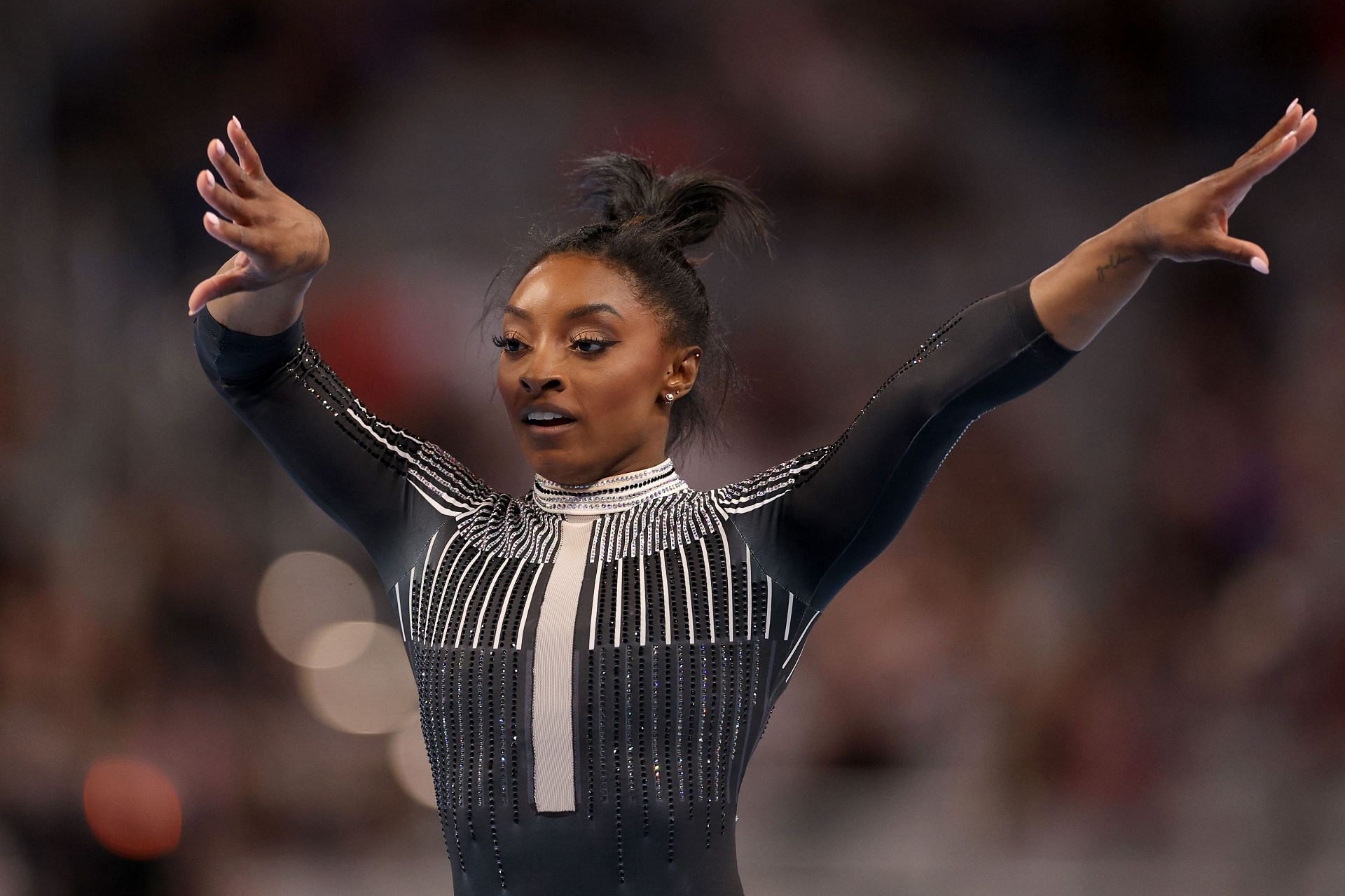 Simone Biles competes in the floor exercise during the 2024 Xfinity U.S. Gymnastics Championships at Dickies Arena in Fort Worth, Texas.