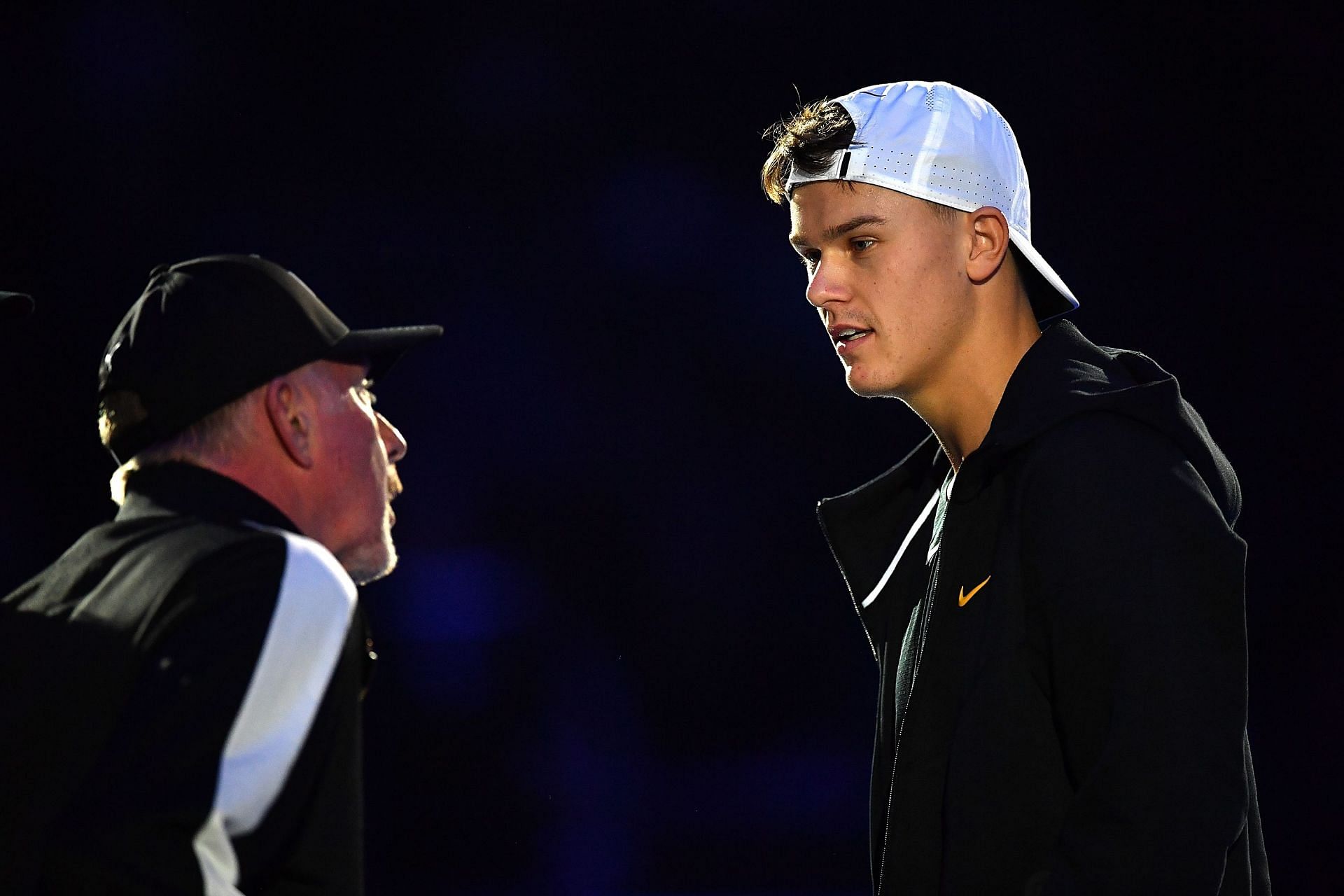 Holger Rune (R) pictured with Boris Becker at the 2023 ATP Finals